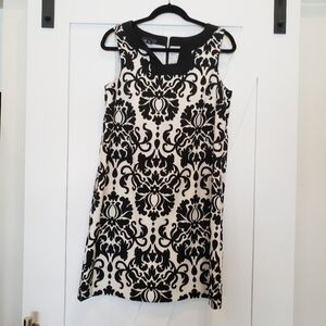 Alyx sheath dress in size 8.  Large black and white print with black trim neck